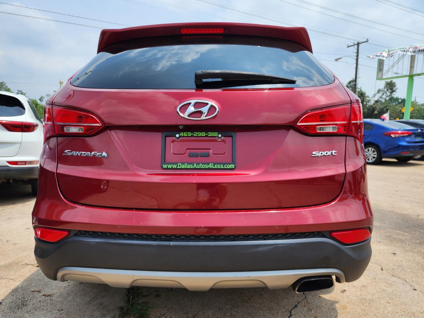 2016 RED Hyundai Santa Fe SPORT (5XYZU3LBXGG) , AUTO transmission, located at 2660 S.Garland Avenue, Garland, TX, 75041, (469) 298-3118, 32.885551, -96.655602 - Welcome to DallasAutos4Less, one of the Premier BUY HERE PAY HERE Dealers in the North Dallas Area. We specialize in financing to people with NO CREDIT or BAD CREDIT. We need proof of income, proof of residence, and a ID. Come buy your new car from us today!! This is a Very clean 2016 HYUNDAI SAN - Photo#4